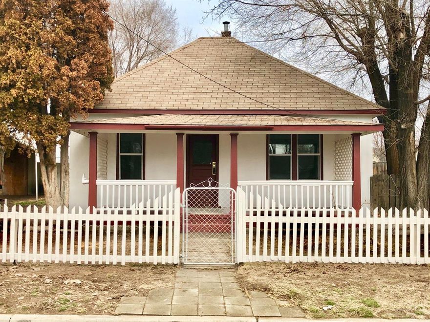 Renovated move-in ready cottage with basement and carport. Oversized lot with fenced backyard and close to schools. Walking distance to downtown and parks.