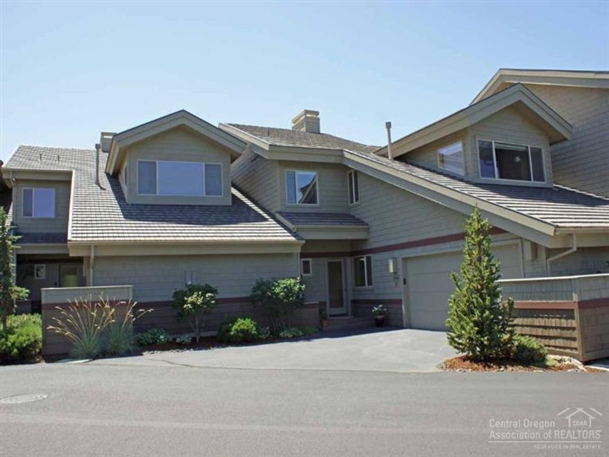 Beautiful Painted Ridge townhome on Broken Top's 10th fairway. This home has a southern exposure and offers beautiful views of the fairway and green. Amenities include a bright kitchen with a breakfast bar, dining area with a built-in buffet, two master suites, and an additional en-suite bedroom/office with built-ins. Features include a gas fireplace, hardwood flooring, newer carpet, solid wood doors and automated window coverings. Trees along the living room and bedroom decks offer privacy.