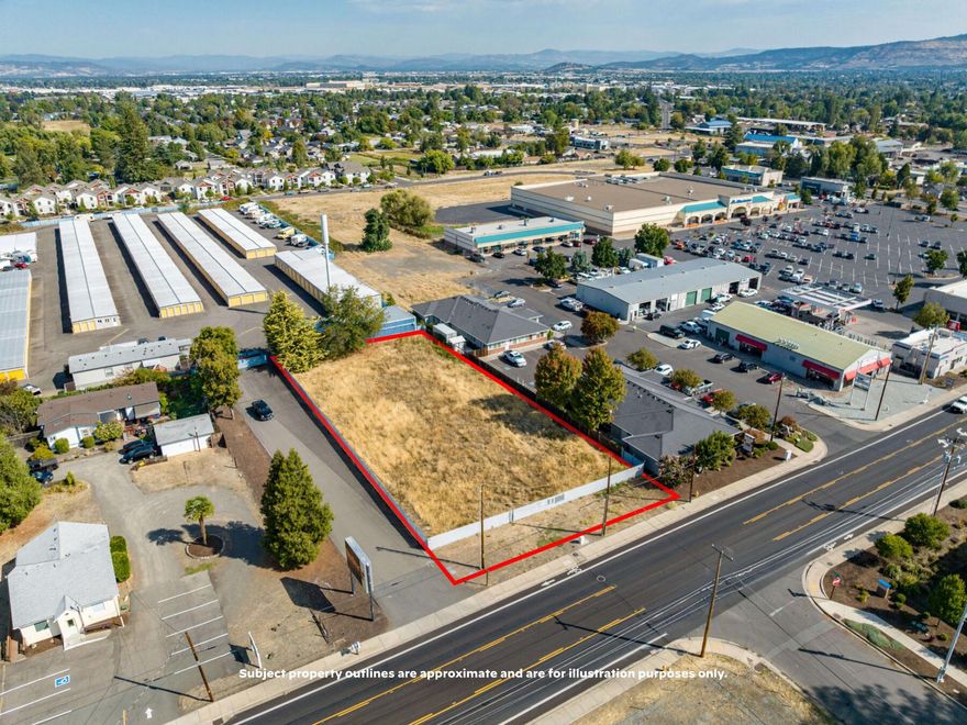 Exclusively presented for sale - 0 West Main Street, an 0.58-acre attainable infill development site located on the high-traffic and rapidly developing West Main area in Medford, Oregon (the ''Site''). The Site is surrounded by grocery-anchored retail, high-quality financial, law, and similar offices, multifamily and new single-family developments. Ideal for a wide variety of uses, the Site enjoys the flexible Heavy Commercial zoning. The level, fully fenced Site is currently accessed via the private paved driveway from the East; additional easement access via W Main to be determined by buyer. All utilities are either stubbed to the property or within a few feet of the property line. Ideal for immediate development or a long-term hold with low relative holding costs. Contact brokers today for more info! Buyer is responsible for all due diligence regarding development, utilities, off-sites, allowed uses, and all other items pertaining to usability of the Site.