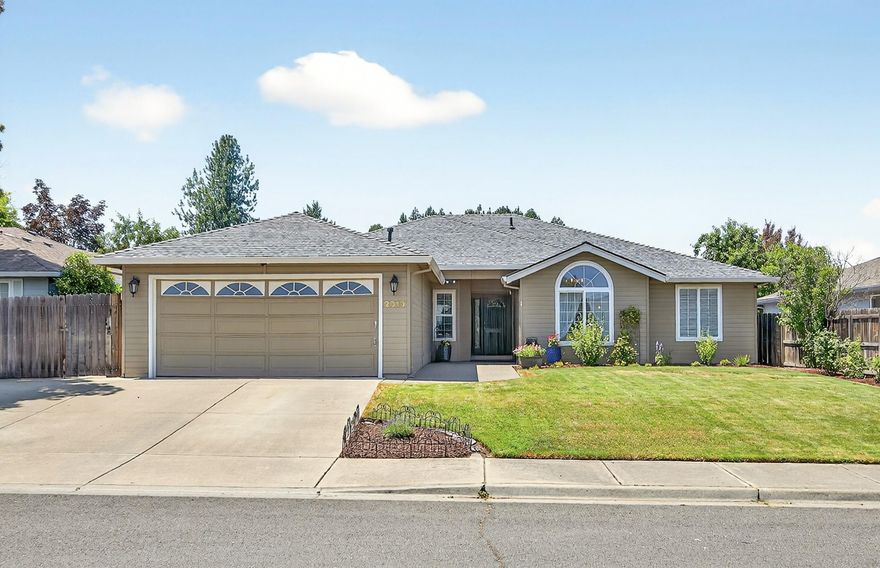 Welcome to this beautifully updated 4 bed, 2 bath gem in the sought-after Griffin Creek Elem area! Light, bright and fresh with a spacious great room, rock fireplace, and stunning new kitchen featuring slab granite, island/breakfast bar, tile backsplash and SS appliances. Thoughtful upgrades throughout including hardwood floors, solid-core doors, slider, window/door trim, baseboards, lighting, plumbing fixtures and fresh interior paint. New roof and water heater in 2024! Enjoy the gorgeous pebble tech pool, low-maintenance yard with outdoor kitchen area, RV parking, and storage shed. Backs to open space for added privacy—this one has it all!