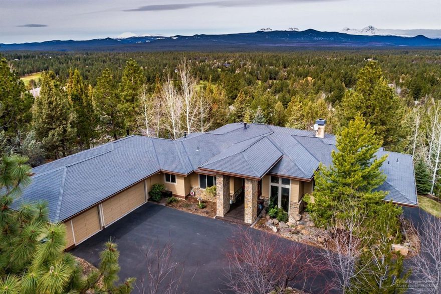 Enjoy iconic panoramic cascade mountain views from almost every room in this beautiful home on Awbrey Butte! This home offers a luxurious main level master suite. Open great room with African ribbon mahogany entertainment center with gas fire place. Gourmet kitchen features slab granite counters, prep island, large pantry, stainless steel appliances w/ a breakfast nook surrounded by windows to enjoy the fantastic views. Bonus living room downstairs has a built in media center, wet bar. Wine room offers refrigerated wine cabinets that hold 200+ bottles. Oversized 3 car garage w/ epoxied floors. Beautifully landscaped yard with outdoor spaces. This is a must see!