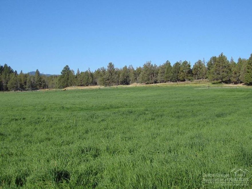Ranch owned by same family for 50 years. Privacy and seclusion abound on this 137+ acre property with six legal lots and three homes, comprising hay fields, ponds, horse pasture, pine and juniper forests. Topography provides both level and elevated areas with majestic views. Borders public lands for miles of hiking and horseback riding. Potential for family compound or equestrian center. Buyers to do due diligence regarding legal lots and building on EFU zoned land. Sale is for only three tax lots CLA.
