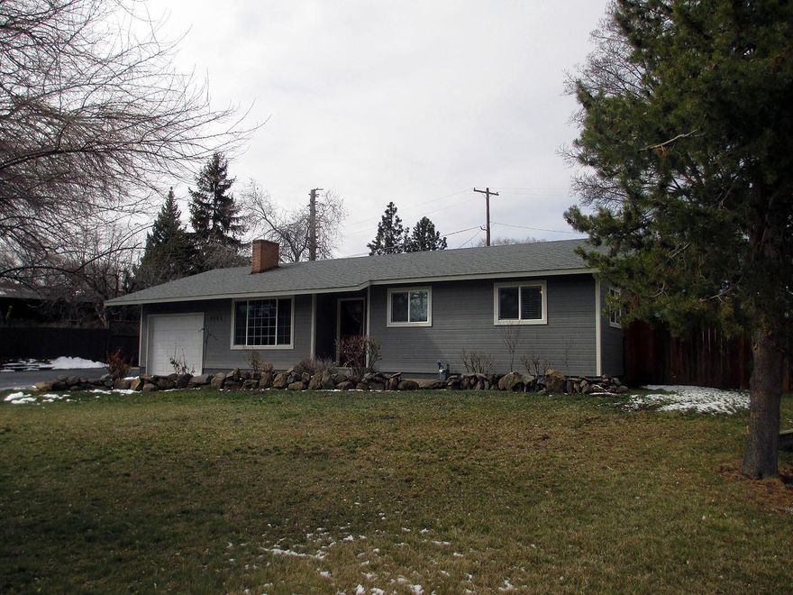 This is a stunning 3 bedroom, 1 and 1/2 bath home! It sits on a quarter of an acre and has room for an RV and additional vehicles. Because of the spacious room available for vehicles outside, the home owners have converted the garage into a beautiful 4th room, that can be used as an office or perhaps the 4th bedroom is a closet is added. Updates throughout with gorgeous hardwood and tile. Updated and spacious kitchen and separate dining an living room area. French doors open up to the outside that includes a covered patio area and 200 sq ft plus shed in the back plumbed for electricity. Easy to show, call for an appointment today.