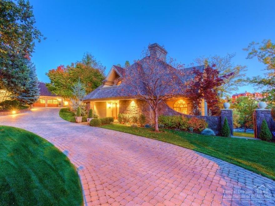 As seen in the Wall Street Journal, this is an exceptional Deschutes riverfront property only a few blocks from downtown Bend! The .64 acre property consists of 3 riverfront lots and includes a 3 bedroom/4 bathroom 4,969SF estate with custom theater room, wine cellar, formal dining room, great room design, and full views and sounds of the river from many windows and patio areas. There is also a separate 1 bedroom/1 bathroom, 611 SF guest house with fireplace and hot tub.