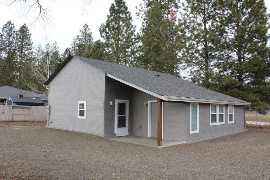 This home has been completely remodeled inside and out, very cute, great location, near school and city services. Heat pump, Hiland Water and city sewer.