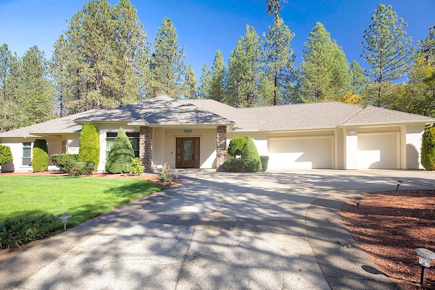 Beautiful custom home on just over 3 peaceful country acres with a guesthouse! This one-of-a-kind property offers an open floor plan with a sunken living room, 12 ft. ceilings, gas fireplace, lots of natural light and elegant hardwood and tile floors. The gourmet kitchen features granite countertops, ample cabinetry, a large island, and is complemented by both casual and formal dining spaces. The split floor plan includes a luxurious primary suite with a barrel-tiled shower and spacious walk-in closet. The 1,600 sq. ft. guesthouse offers 3 bedrooms, 2 bath, and its own septic system — perfect for family or income potential. Plus, enjoy a gated entry, paved driveway, full and interior fencing, a generator, and park-like grounds with 2 sheds, a metal shop, and 2 wells. This unique property is a rare blend of comfort, function, and country charm! Schedule your personal tour today!