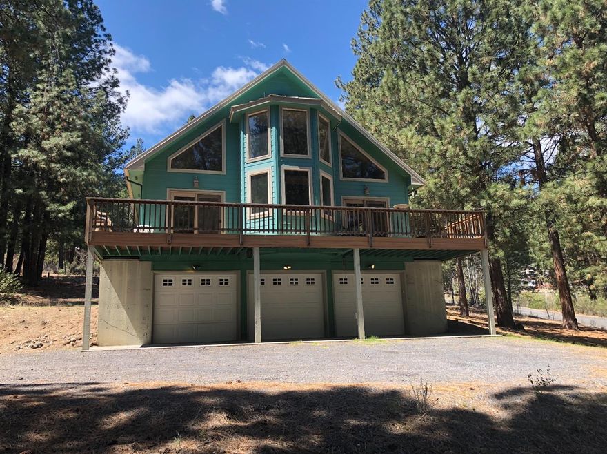 Beautifully built 2004 home in a peaceful, wooded setting on just over an acre. This 3 bed/2 bath home boasts lovely features inside and out, including a large wraparound deck and is just a few minutes walk from the gorgeous Williamson River. Lovely master bedroom with ensuite complete with jetted tub and walk-in closet. Great kitchen with Jenn-Air cooktop, all appliances included in sale (chest freezer in garage stays). Access to common recreation lot on the Williamson River with private fishing opportunities. Come see this beautiful property today for your chance at your very own piece of paradise! Seller offering $3500 credit toward new deck. Being sold as package deal with 2984246, total taxes are for both lots.