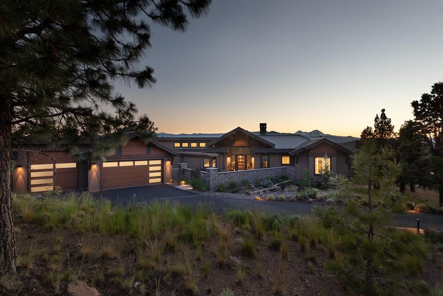 Custom built NW contemporary home with panoramic views from Mt. Bachelor to Mt. Hood. Norman Building & Design featuring high quality details throughout (too many to list here, see attached document). Single level open floor plan with walls of windows letting in abundant light and spectacular views. Vaulted ceilings with exposed beams, fireplace with floor to ceiling surround, hardwood floors. Thermador stove with double oven, custom hood, built-in refrigerator, walk-in pantry. Primary Suite with large walk-in closet & access to laundry room. Primary bath features tile walk-in shower with radiant heat & soaking tub. Two guest suites featuring walk-in tile showers & one steam shower. Private office with built-ins. 1,168 sqft 4 car garage, 220 power for electric cars, built-in cabinets with sink, gas heater, third bay features an 11 ft. overhead door & RV drain receptacle. Covered patio for entertaining with gas fire pit & ceiling mounted electric heaters. Front enclosed courtyard entry.