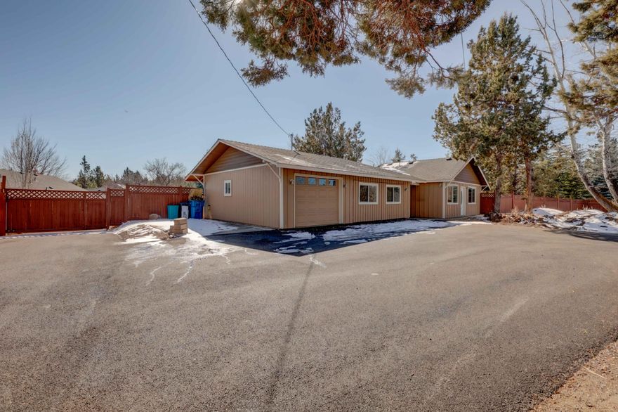 This beautiful recently remodeled  two bedroom two bath home has tons of upgrades. The home is on almost a half of a acre lot, in the heart of Bend.  There is a one car garage with a additional two car garage that could be used as a bonus room/office/bedroom.  The kitchen has hickory cabinets and granite countertops. Has a convection oven and borsh dishwasher. The bathrooms have  heated floors, and tile in the showers.  There is views of south sisters and pilot butte. Rv parking and hookup.  Its only a short walk or bike ride to pine nursery park. Close to schools and medical facilities. 

There is many possibilities you can do with this great investment property.  Such as  build a shop, or ADU,.  Buyer to do there own due diligence.