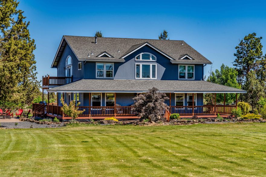 Beautiful 4 or 5-bedroom Craftsman on 7 acres w/ 5 acres of irrigation rights. 4 bedrooms upstairs including the primary w/ a balcony looking out to the mountains. The downstairs bedroom(s) are currently an office space & could be split into 2 rooms. Plenty of options w/ 2 living areas & a gorgeous kitchen w/ huge island, breakfast bar, many newer appliances, which overlooks the uniquely designed Natural Swim Pond/Pool.  The Swim Pond features a 6' deep swimming area, deck, & waterfall...enjoy the views of the swim pond year-round. Perfect for family gatherings and or entertaining w/ a covered area deck. Meandering pathways through wildflower gardens, 4 acres fenced, ready for crops or pasture for your horses, goats, or cattle. Country living at its best, yet close to everything. Minutes to Bend. A unique property to call home!