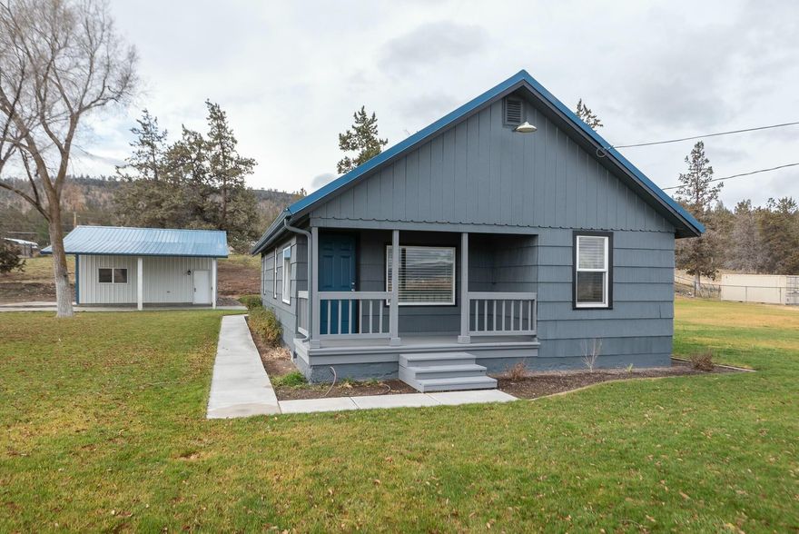 ONE OF A KIND on 1.25 acres!
Built in  1948, this 1071sf cottage offers 2 bedrooms and one bath on one level with a nice big, bright kitchen. Fenced and landscaped with recent upgrades including fresh paint in and out, appliances, flooring, lighting.  Well & septic + underground sprinklers.  Large, detached 480sf garage building with high ceilings and overhead door has attached carport as well.  Country living and just a quick jaunt to the reservoir or all Prineville has to offer!