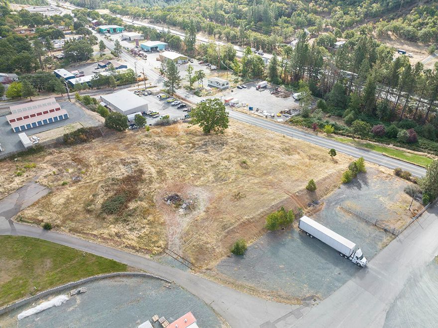 For Sale or Lease! 3.11 Acres of Prime Rural Commercial Property with Fantastic I-5 Exposure & Easy Access in the Town of Grants Pass, Oregon! This Desirable Property Offers a Power Drop and Meter, & Other Utilities. Rural Industrial Zoning allows for a multitude of Industrial/Commercial uses, & allows for Property Division into 1/2 Acre Parcels! Minutes to City Limits & I-5 Ramps, & enjoys a Low County Tax Rate. Ready to go for your Next Commercial Venture! Paved Access and Drive, and Excellent Signage. There is Amazing Opportunity here!