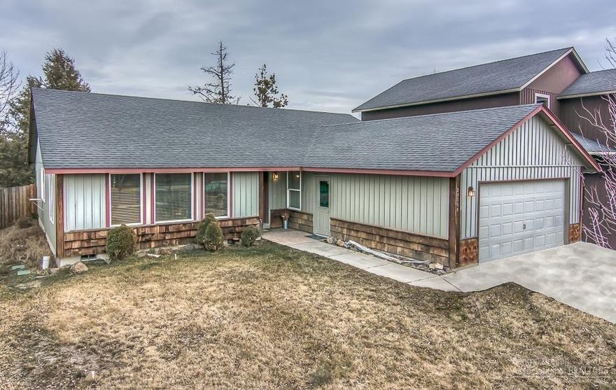 Warm & inviting home in NW Bend near the new Riley Ranch Nature Reserve & minutes from downtown! Large front window has a peek-a-boo Cascade mountain view. Hard to find single level with large living room that opens into the dining area & kitchen. New laminate wood flooring & bathroom upgrades add to this charming home. Located on a cul-de-sac with a fully fenced backyard that looks onto an open space. Ready for your personal & decorative touches.