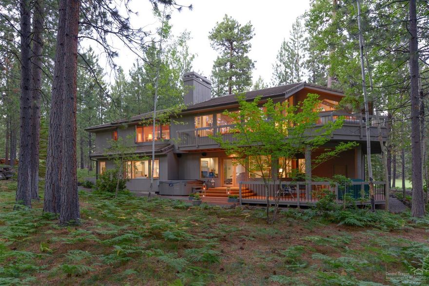 Timeless Black Butte Home, designed by Paul Miller to maximize lot features,views and natural light. This open concept home has two levels of living space. Main includes great room,fireplace,dining,kitchen,powder room and main master suite with fireplace.Guest level includes family room,fireplace two bedrooms with ensuite baths. Extensive decking,hottub,full house sound system and so much more...