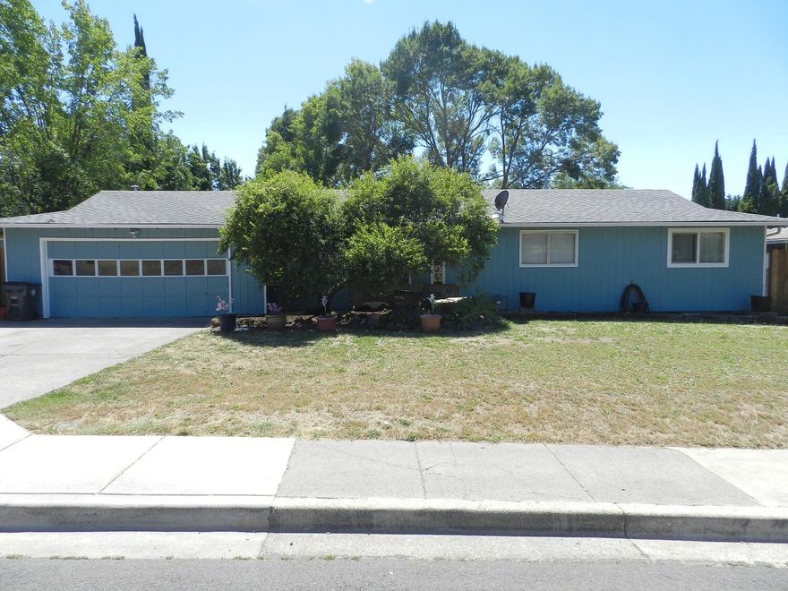 Darling home close to schools and short distance away from the well known expo and fairgrounds where you might even hear a band play or possibly enjoy fireworks displays from your home! You'll have a large yard, garden boxes, a nice shed and even a dog house & run. Freshly painted inside and out, is this fantastic ranch style 3 bedroom 2 bath with lots of updates, lovingly lived in by the same family for over 20 years. There is a separate family with a rock fireplace and windows for natural light, a front living room, both spacious for entertaining, the kitchen is newer with alder cabinets, making this a beautiful place to cook and enjoy. There is a 2 bay garage, and courtyard style entry. This is a great home and property!