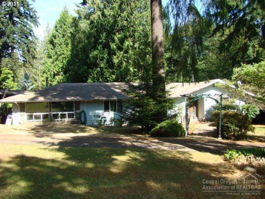 Large ranch home with guest house on 4.77 treed lot. Lots of potential, sold as is. Large 40'x60' outbuilding/shop, well, septic and various buildings.