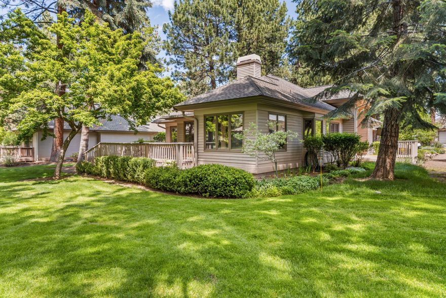 Beautiful single level 2 bedroom/2 bath home in gated Mtn. High! The home sits on .18 acres with park like views from the kitchen and living room. Bedrooms are large with the primary bedroom having a huge walk-in closet and an updated primary bathroom. Primary bathroom as well as guest bathroom have travertine tile floors as well as custom cabinets.  There is a large office/den, perfect for hobbies! This area has been enclosed and can be used for a third sleeping area.  The cozy living room features a gas fireplace and looks out to an expansive deck, perfect for entertaining. Kitchen has been updated with a gas range, new refrigerator and backsplash tiles. Kitchen is also complete with an eat-in breakfast area. Beautiful wood flooring throughout the home. There is lots of storage throughout the home with an additional area above the garage that is very accessible. Beautiful front and back landscaping as well as a large deck. The private lot backs to common area. Perfect for relaxing!