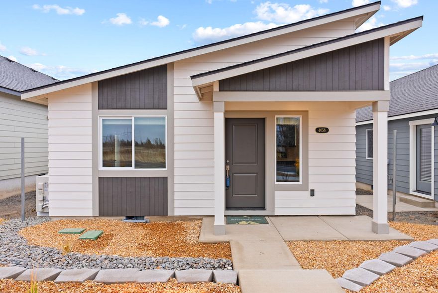 Welcome to the Astoria at Feather Ridge—a single-level home offering 2 bedrooms, 1 bathroom, and 880 square feet of well-designed space. The open-concept layout features a spacious great room, stainless steel appliances, and luxury wood laminate flooring. A covered front porch adds charm, and the 2-car garage includes attached external storage for added functionality. With thoughtful finishes throughout and a location close to local parks, mountain views, and the future Redmond Recreation Center, the Astoria is the perfect fit for those looking for comfort, quality, and low-maintenance living.