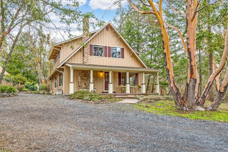 Privacy, tranquility & great indoor/outdoor living on your own slice of paradise. Out of the fray, yet just minutes to Jacksonville in this secluded, move-in ready home/retreat with inviting ambience. From the covered front porch to open concept floorplan, this is a well-maintained beauty. Cozy woodstove with river rock hearth anchors the living room with a tastefully updated kitchen & dining room. Amazing views to the park-like 11+ acres that is close to BLM land. A unique, large screened-in back porch offers picturesque multi-use living-dining, entertaining, sleeping, hanging out. Move from park bench to park bench, amongst oak savannah, madrone/fir groves, & views of the valley beyond. Settle in on the patio for a hot tub soak, accompanied by birdsong/wildlife watching, stargazing, or BBQ with friends. Finished, insulated shop/garage with bench/shelving. Updated flooring, kitchen, bathrooms; newer roof & in/out paint, thinned acreage, much more.