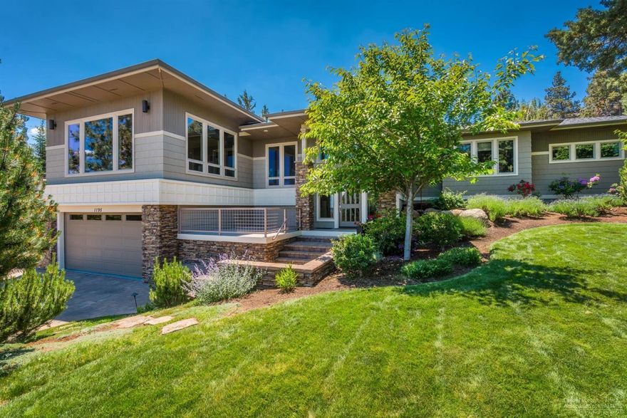 Grand contemporary home atop Awbrey Butte w/ sweeping views from Mt Hood to the Ochocos. Bright, open greatroom layout w/ designer picked interior, 3 suites, office & gourmet kitchen on main level. Exercise Rm, Wine Rm, 2nd Powder & Media Rm currently being used as an artist's studio below. Exquisite mature landscaping, water feature & rear patio w/ fire pit provide shade & an intimate & calming space, while the front deck provides sun & stunning views-both conveniently located off kitchen/dining areas.