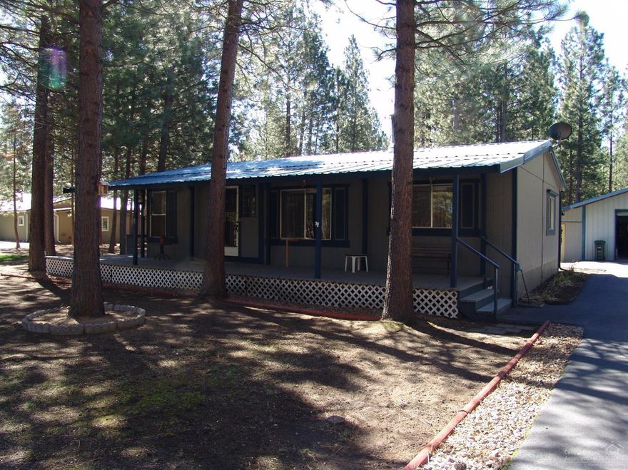Cute home in Ponderosa Pines! 3 bed 2 bath 1080sf, clean with recent updates, great shop, paved driveway, and wrap around deck! Close to recreation - lakes, rivers, and much more!