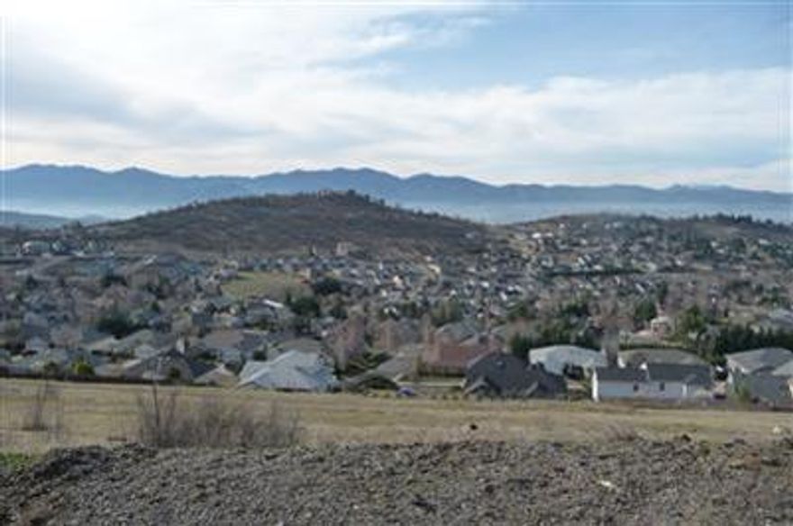Some of the most incredible valley views await you from this top of the hill residential lot. The Ridge at the Highlands is a planned community located off Cherry Lane in East Medford and offers the opportunity to build your dream home with views of Mt. Ashland and the city of Medford. This community focuses on maintaining views and access to open spaces with planning of public and private streets, as well as single family residential and garden home lots. All 6 single family lots available for bulk price of $349,000. Entire Ridge at the Highlands bulk sale also available.