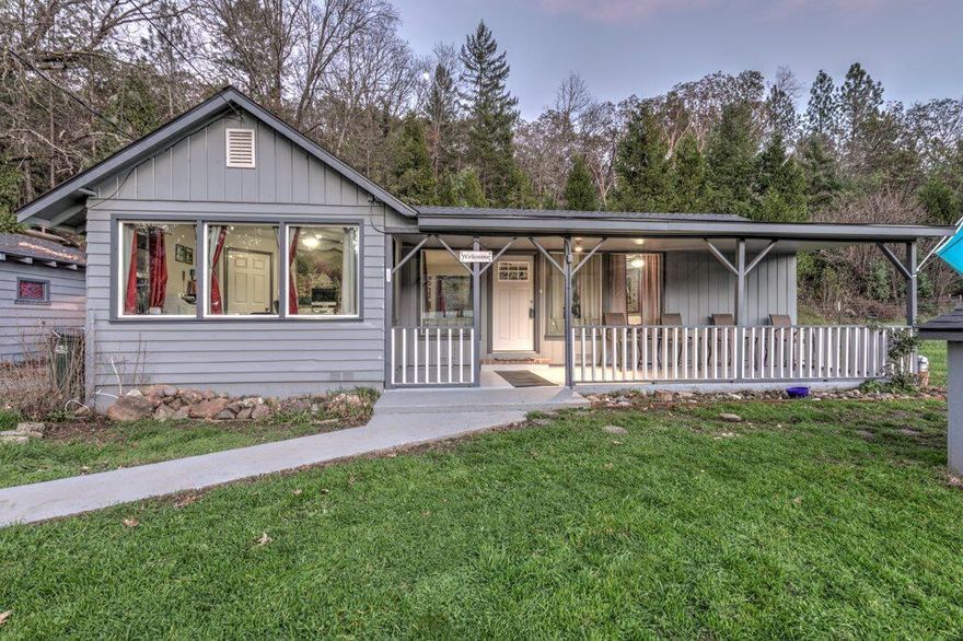 Great new price on this cute home with many new updates including a NEW ROOF.   Bathroom has been completely remodeled with new flooring, vanity and tub/shower.  Kitchen is large with newer appliances and lots of counter space.  New laminate flooring throughout.  Living room is very spacious with great light from windows giving you amazing views of the mountains.  Utility room is just outside the kitchen and offers lots of extra storage room.  The big 400sqft garage is currently being used as an additional music studio, but could be converted back to a garage easily.  NEW SEPTIC in 2018.  NEW well pump, however city water is just across the street if you wanted to connect! Pipe is already ran up to the house.  Property abuts BLM land for privacy and the feel of much more than the 1 acre.  This is a gem of a property and great for the first time buyer and a family just starting out or the empty nesters wanting to downsize.  Shown by appointment only.