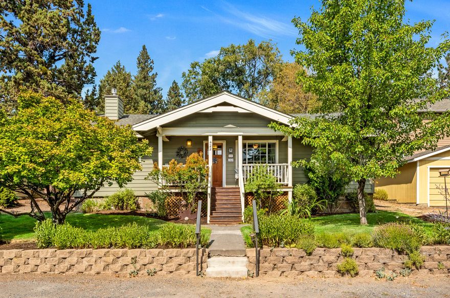 Step into the charm of this 3 bed, 2 bath, 1,524 total sq. ft. cottage, enhanced with modern updates including vinyl double-pane windows, laminate wood flooring, a new gas stove. The eat-in kitchen is bathed in sunlight, evoking fond memories of grandma's kitchen. The attached apartment offers flexibility and extra space for guests or rental income. The original carriage house on the property has been thoughtfully preserved, providing stable storage or the potential to become an ADU for even more possibilities. Whether you're savoring a morning coffee or hosting gatherings with friends and family, this outdoor area is perfect for all your needs. Enjoy the best of both worlds in this serene and quiet neighborhood, just blocks away from the heart of downtown and the picturesque river, trails, and dog park. You'll have easy access to shops, restaurants, and recreational opportunities. Don't miss out on this versatile property that blends historic charm with contemporary comforts