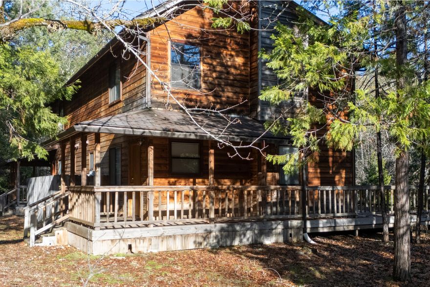 Hidden Gem Investment: Creekside Four units in Selma. Discover an exceptional investment opportunity nestled on the banks of a year-round creek, just 17 miles southwest of Grants Pass in the peaceful community of Selma. This unique property features four quality rental units, all designed for comfort and privacy in a beautiful country setting. Two Single-Story Homes: Each offers 3 bdrms  1 bath, perfect for tenants seeking extra space. Both homes are in xlnt condition, with the owner already starting tasteful modernization updates.  Two Townhomes: Spacious 2 bdrm, 1.5 bath layouts with large private decks overlooking the tranquil creek—ideal for relaxing or entertaining. Scenic, Serene Setting: All units enjoy picturesque views and the soothing sound of the creek, surrounded by mature trees and open skies. While the interiors retain some classic touches, the pride of ownership shines through—the units are well-maintained and move-in ready. This ppty stands out as a rare find!