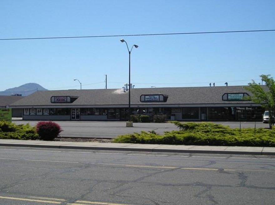 Cascade Shopping Center. Great opportunity in beautiful Rogue Valley of Southern Oregon for neighborhood commercial center at busy signalized intersection. 7.63 +/- acres on 22,000 ADT main route to cascade mountain lakes and recreation areas. Multiple structures & multiple tenants, popular theater, ground lease with Taco Bell.