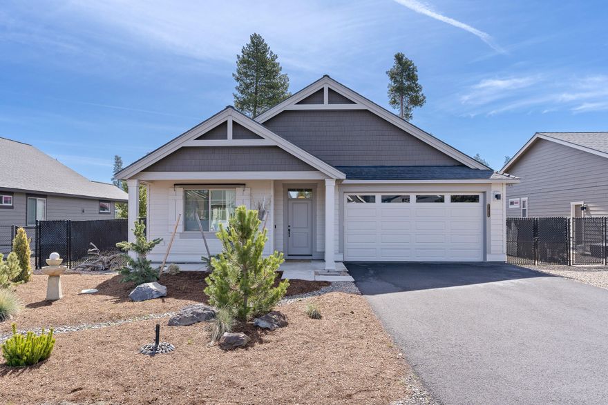 Stunning Chapman model by Pahlisch Homes welcomes you with a spacious and elegant interior. Wide foyer, vinyl plank flooring, vaulted ceilings, and abundant natural light create an inviting atmosphere. Thoughtfully designed, with 2 bedrooms plus an office at the front, and the primary suite is situated towards the back. The kitchen is a chef's dream, with a brand new LG Dual fuel range, Bosch dishwasher & quartz countertops. The living room showcases a floor-to-ceiling fireplace and custom built-ins. The primary bedroom offers a luxurious en-suite bathroom and walk-in closet. The backyard is your own private sanctuary, complete with an extended patio, covered porch, pergola, xeriscape landscaping, and privacy screens around the 6' fence. With over $35,000 in upgrades including a/c, this home is better than new and an amazing value! Enjoy community amenities including a clubhouse, gym, sports courts, park & trails