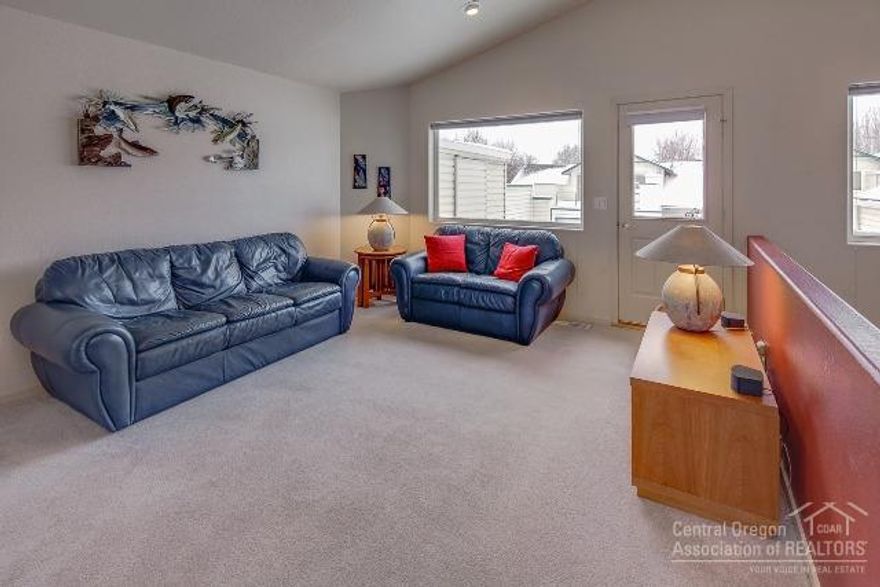 2BD/2.5BA Townhome at Boulder Brook. Reverse living floor plan. Vaulted ceilings, lg Mstr BD/Mstr BA. Gas fireplace in Living Rm. Large upper deck for entertaining off living area of home as well as small upper patio for enjoyment. HOA covers Water/Sewer/Ext Maintenance/Landscaping. Neighborhood features nice pond/park area for residents. Dble attached garage w/newer roof & gutters. Siding & patio/deck sealing updated approx 5 yrs ago. Original owner, home has been lightly lived in & in excellent condition.