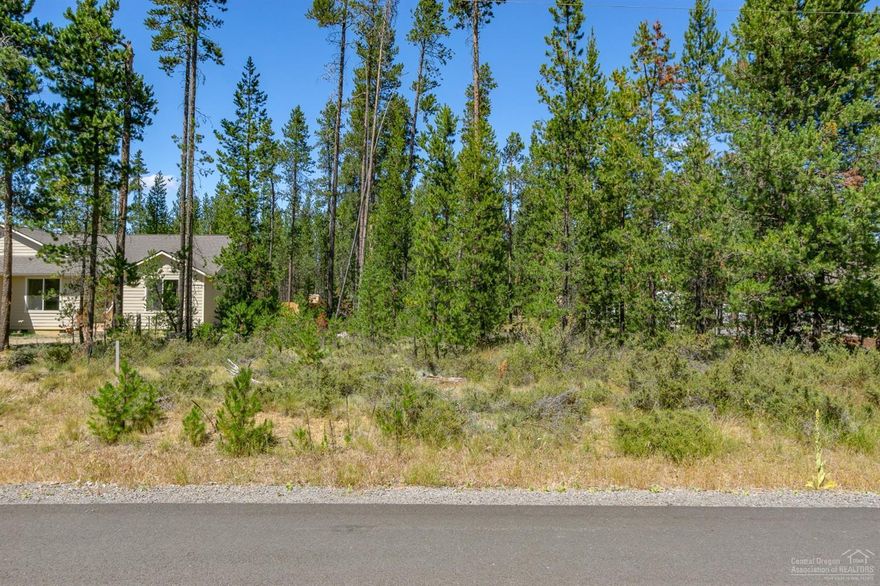 Nicely treed level ready to build lot in Oregon Water Wonderland. Build your dream home on one of the few remaining lots in this desirable HOA community close to Sunriver and the Deschutes River. Just a short drive to the Cascade Lakes and Mt. Bachelor. Bring your toys & play in Central Oregon's recreation paradise. Private community boat ramp, dock, and park with deeded access for OWW2 owners only. HOA includes road maintenance & snow plowing.