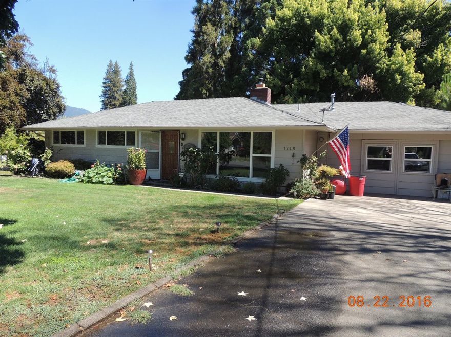 Fantastic family home close to everything and in a terrific neighborhood. Extremely well cared for inside and out. Ranch style single level with 3 bedrooms, 2 baths, open kitchen with breakfast bar, large dining area, covered rear porch and living room with fireplace. Irrigation to the property. Lovely landscaped front and rear yards. Central heating and air conditioning. Two car garage and garden shed.