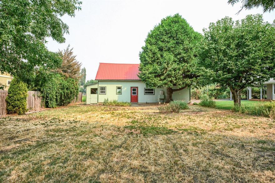 Great building lot in Ashland. Right on the edge of a well established neighborhood, Mill Pond, yet not a part of their HOA, this lot has offers many features to enjoy. The .19 of an acre lot has the original barn, that used to be a dairy barn. Long gone are the days for that use, and the barn has been restored and renovated to provide lots of storage space and even a small studio apartment. All utilities are already on site and ready for your building plans. Some provisional work was done with the city of Ashland that demonstrates what can be built on the site.