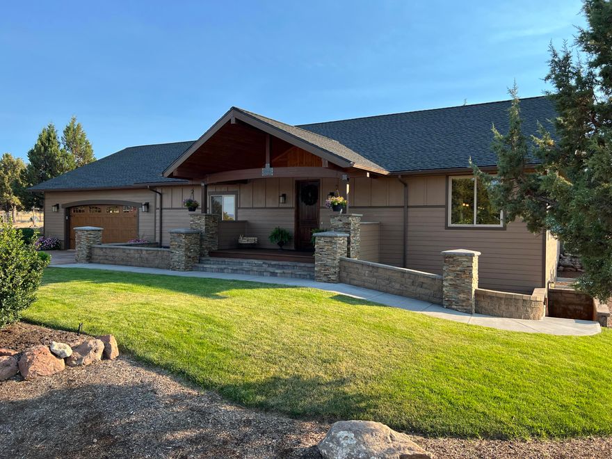 Privacy and quiet setting on this 55.20 acre hidden gem in the prettiest farm country of Central Oregon with stunning views and awesome 30x12 separated guest quarters. 2363 main floor + 760 below grade = 3,123 main & lower finished sq. footage PLUS 360 sq. ft. finished guest quarters above garage. 60x45 barn w/approx. 40x32 RV/shop space, 12x12 overhead w/elec door opener, approx. 60x11+ insulated finished sports/pool rm w/ built-ins. Propane kitchen cooktop, large HW heater and electronic air filter, front & back sprinkler system. Horse stall and irrigation water for livestock and animals. Majority acreage for pasture and farming with ATV trails and hiking trails in the trees on the property overlooking farm valley in Central Oregon. Property borders North Unit main canal. So secluded with quick handy Hwy 97 access, Redmond, Sisters, Bend... Property built and setup right and fabulous.