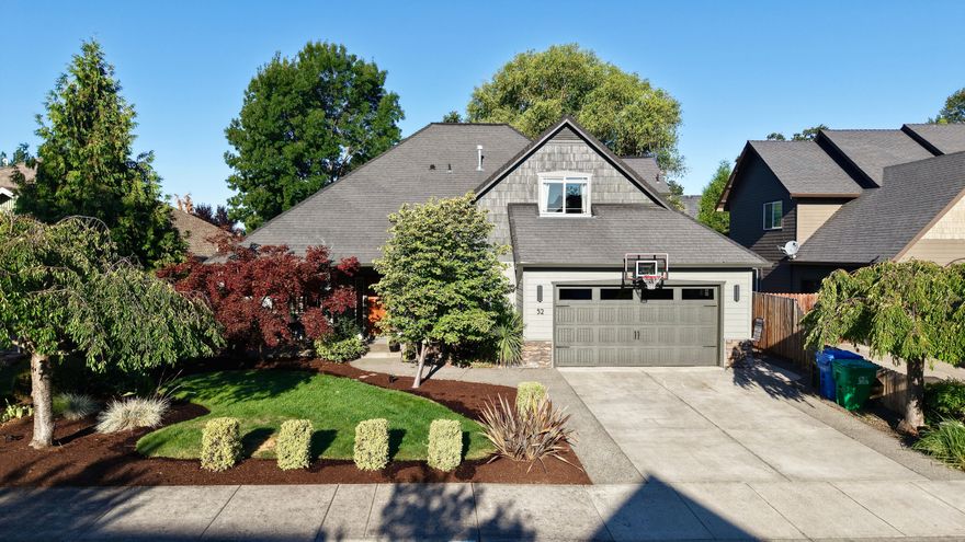 Beautifully maintained two-story home located near the Eagle Point Golf Course in a quiet, established neighborhood. This 3-bedroom, 3-bath home offers 2,324 sq. ft. of comfortable living space with quality finishes throughout. Enjoy vaulted ceilings, hardwood flooring, a cozy fireplace in the living room, and a well-appointed kitchen with granite countertops and a gas cooktop. The spacious main-level primary suite features its own fireplace, two large walk-in closets, and a luxurious Jacuzzi tub. Upstairs you'll find two additional bedrooms and a full bath. An extra guest bath is conveniently located on the main level. The .24-acre lot includes mature landscaping, a fully fenced backyard, a covered patio for year-round enjoyment, and recent exterior paint for added curb appeal. Just minutes from the golf course, this home combines elegance, comfort, and location. Listing agent related to seller.