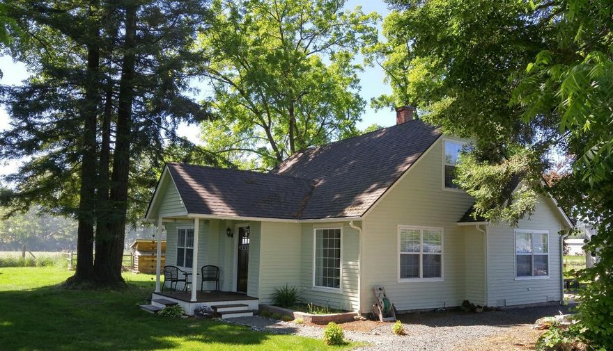 Nicely updated 3 bedroom, 2 bath farmhouse located on 3.9 irrigated acres near Fort Vannoy Farm. The property is surrounded by pastures and beautiful mountain views. The master suite, located on the main floor, includes a soaking tub, large walk in shower, tile flooring with radiant floor heat and a 6x10 walk in closet. There are 2 additional bedrooms and a 3/4 bath upstairs. The home features new laminate flooring downstairs and fresh paint throughout. New stainless appliances, new stainless sink, new faucet, and under cabinet lighting in the kitchen. Nice sized dining room with built in cabinets. Both the electrical service and plumbing have been updated. The property is fenced and cross fenced.