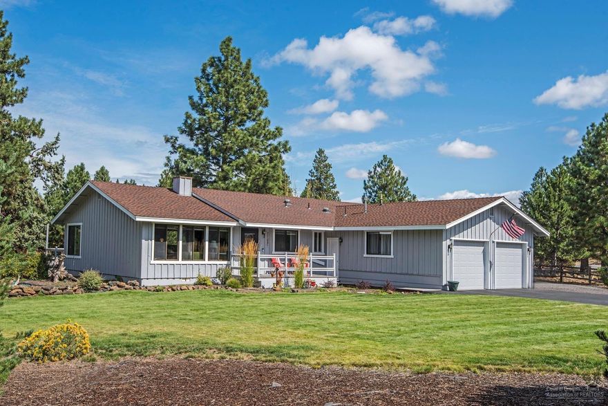 Looking for space in Woodside Ranch? Look no further. This newly updated open and bright single level 4 bedroom home has an awesome great room vaulted with beams. The kitchen features a new range, microwave, and wood flooring. Both bathrooms have been remodeled with granite and marble. Central and zoned heating. New paint inside and out and upgraded plumbing fixtures. RV parking, auto sprinklers, 8x10 storage building and a 2 car garage. Over $60,000 in upgrades! Situated on 8/10 of an acre on a mature treed lot which backs up to the canal and a nice walking/nature trail. Room to build a shop as well. Sellers are installing a new 6' privacy fence. Sellers are downsizing, move in ready!