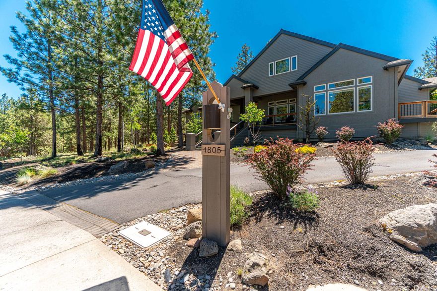 Welcome to 1805 NW Remarkable, a beautifully designed single-level home in the desirable Awbrey Butte in NW Bend. Situated on a sprawling 0.71-acre lot, this light-filled residence offers a seamless blend of indoor and outdoor living with a thoughtfully designed open floor plan, high ceilings, and neutral tones throughout.

The spacious kitchen is a chef's dream, featuring stainless steel appliances, a beverage fridge, a double oven, a 5-burner gas cooktop, and a large center island with leathered quartzite perfect for entertaining. Adjacent to the kitchen, the dedicated family room boasts built-in shelving, adding warmth and functionality to the space.

The home's ideal layout places three bedrooms on one wing, two of which are connected by a beautifully remodeled Jack and Jill bathroom, while the expansive primary suite enjoys its own private retreat on the opposite side, along with a dedicated office.  A private backyard space and 3 car garage round out this exemplary property.