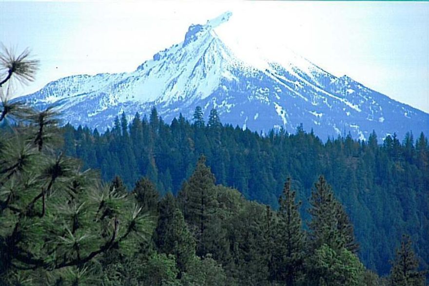 40 Acres of total privacy and gorgeous views of conifer tree tops and Mt. McLaughlin. Whether you make this your year round home or vacation get-away, the bricks are already laid. The well is drilled (5 gpm.), septic is installed, driveway and home are in. The home is waiting for your final touch but mostly complete; built in 2000 providing a roomy 1,848 sq. ft., manufactured, four bedroom, laminate flooring through the open living room, dining area and hall. Property is currently off the grid but generator ready. Listing agent is currently getting an estimate for power; (only for the purpose of knowing what it would cost). This is a beautiful piece of property bordered by hundreds of acres of contiguous government land which means more land for you to play on without paying the taxes for.