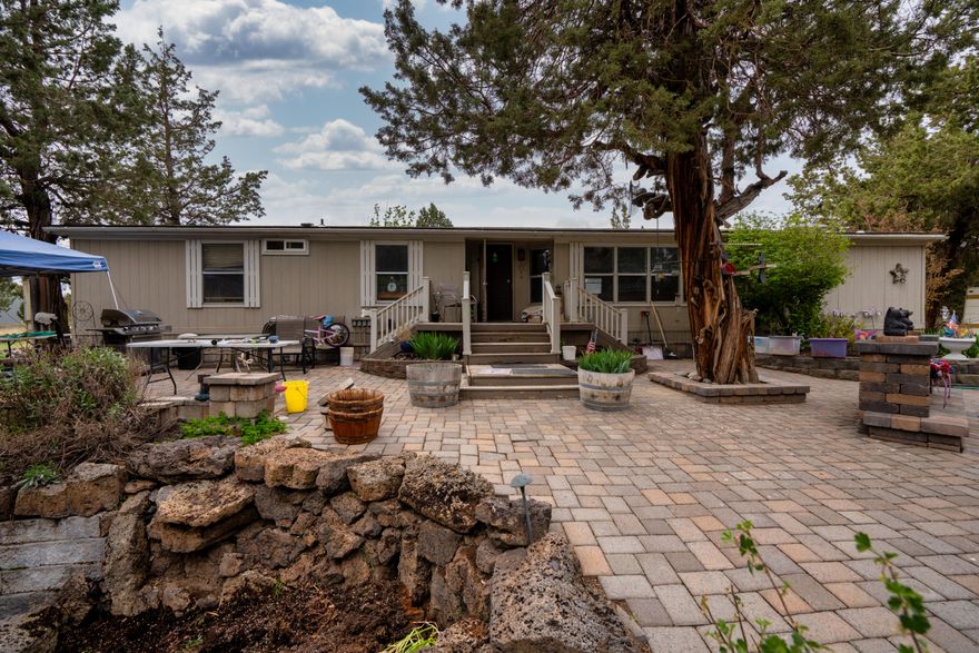 This 2.56-acre property in the desirable Tetherow Crossing subdivision has much to offer. This 3-bedroom, 2-bath home features a spacious floor plan with endless possibilities. A detached outbuilding makes a great shop or potential extra living space. Surrounded by natural vegetation and wildlife, there's plenty of room for projects, outdoor fun, and hosting guests. Bring your vision and don't miss your chance to own a little slice of high desert paradise!