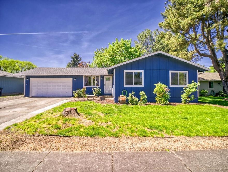 Recently Remodeled Central Point home in Mae Richardson School district. 3 Bedrooms and 2 full Bathrooms on a large lot. Light and Bright Open floor plan with pre-finished hardwood floors. Enjoy cooking in the kitchen with plenty of cabinets, a large pantry cabinet, slab granite counter tops, matching appliances and a wonderful view of the backyard. Other updates in 2017 include a high efficiency furnace, new roof, carpet, vinyl windows, interior doors & hardware, new paint inside and out, lighting, and garage door opener. Both Bathrooms were updated with custom tiled tub/shower surround (shower surround in the master), tile flooring, vanity with double sinks in the hall bathroom (single sink vanity in the master). The Garage was recently finished and insulated with extra soundproofing. Large, fenced backyard is perfect for entertaining, gardening or just relaxing in the sun.