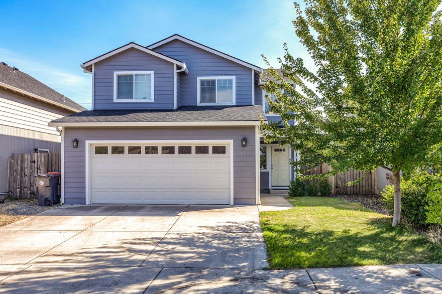 Beautifully maintained 2016 built, two story style home located in a newer subdivision in White City. This gorgeous, 1,728 square foot, 3 bedroom-2.50 bath home with its open floor plan has lots upgraded features that include: large open kitchen with custom cabinets, granite counter tops, tons of counter space and cabinet storage, stainless steel appliances, breakfast bar, formal dining area, huge living room with large windows, tons of natural light and slider door access to the covered rear patio and yard area. The upper level includes two nice size guest bedrooms and hallway guest bathroom. The spacious primary suite has a large walk-in closet with built-in closet organizers, primary bath with double sink vanity, granite counter tops, tile floors and 5' shower. Other features include: vinyl plank flooring, ceiling fans, front entry open to the 2nd floor, interior utility room, finished garage, nicely landscaped and fenced yard with auto sprinklers.