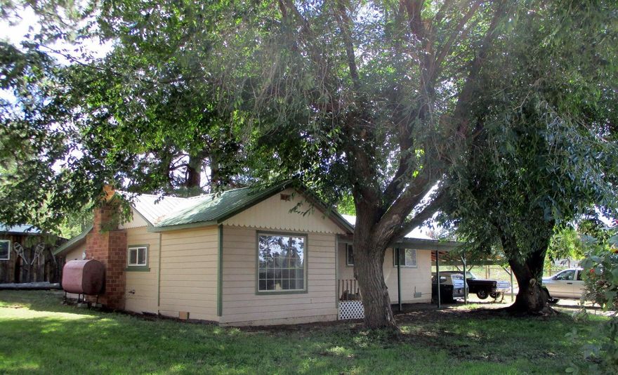 This Country Charmer Features 1 bedroom 1 bath, Fireplace, Partial basement. Bunk House with room for guest and room for storage. Covered Carport, Garage/Shop with workbenches and a loft. Full size Greenhouse and garden area. Gorgeous mature trees, Rasberry plants. This is a Great location in a quiet neighborhood, with very little traffic.Relax and Enjoy the Sunsets and Agency Lake and Mountain Views!  For the Fishing Enthusiast minutes to Agency Lake. Willamson River, Wood River Wetlands. Boat Dock on Agency Lake within 2 miles. 30 minutes to Crater Lake National Park.  Motivated seller is selling the home as is for health reasons. Seller will consider owner carry terms on balance with $150,000 down payment.
