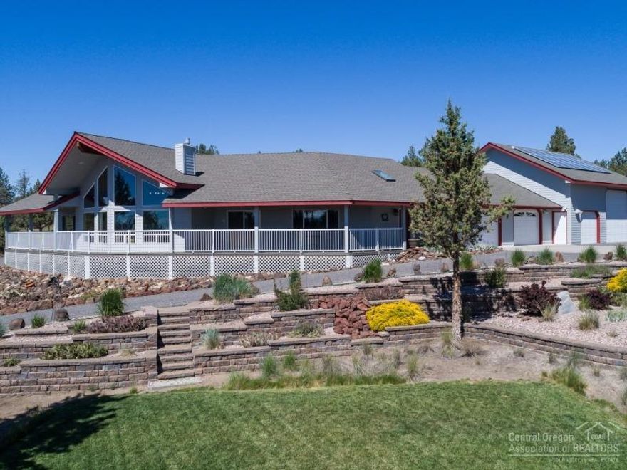 Crooked River Ranch custom home with gorgeous Cascade Mountain Views. Home has an open great room vaulted floor plan with huge floor to ceiling windows. 2012 sq ft garage has workshop, parking for 3 cars and drive through RV garage. Property has full RV hook ups, solar panels and is xeriscaped. River access path across the street allows you to walk to the river from your front door!. Enjoy all the amenities that Enjoy all CRR has to offer: hiking, biking, golf, fishing, swimming, restaurants and more.