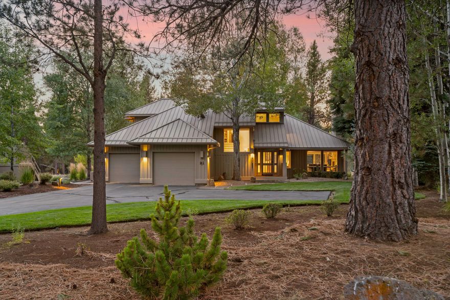 Discover your Sunriver sanctuary! This meticulously maintained, quality-built Sun Forest Construction home sits on an oversized .43-acre lot, just a short distance from the Deschutes River & Cardinal Landing. The traditional 2-story design features an open floor plan with a primary suite on the main level. The great room boasts lots of windows for natural light and a vaulted wood ceiling & a striking Ochoco stone floor-to-ceiling gas fireplace. The kitchen is a chef's delight with Corian countertops, a center island, pantry, & hardwood floors. Upstairs, find 2 guest bedrooms, a full bathroom, a cozy loft with a library, and a storage area that could have the potential to expand into a 4th sleeping area. Enjoy a large, private deck with hot tub looking out onto the beautifully landscaped setting. Air condition for summertime comfort. With a durable metal roof  this home is ready for your immediate enjoyment.
