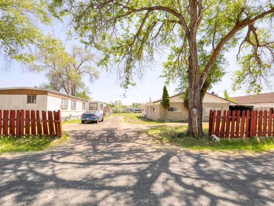 Discover the 3-bedroom 1-bathroom home sitting on a spacious 0.47-acre lot right in town. This property offers privacy, potential, and plenty of space for your vision whether you're looking for a place to call home, or an investment opportunity, this property checks all the boxes.