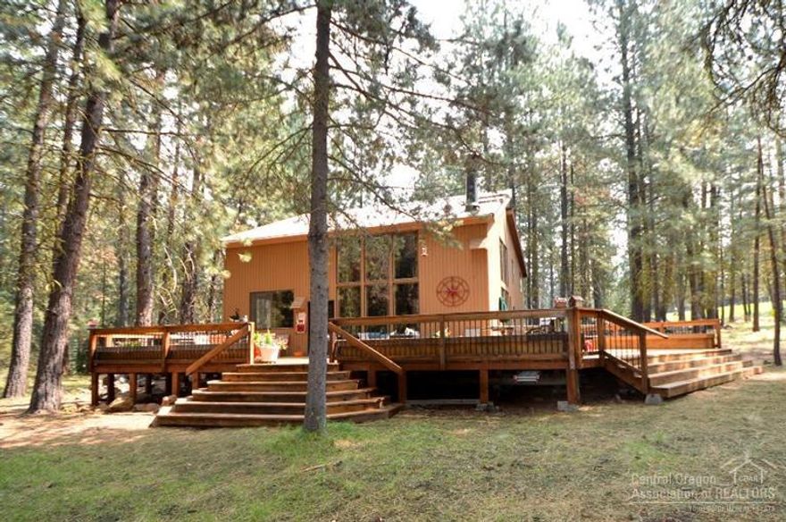 Adjacent to the 14th fairway of the Big Meadow golf course, this one owner home has been updated in the last year, including new kitchen appliances and counters, AC, bathrooms fixtures, etc. Large deck with view of pine forest and golf course, located at the base of the sled hill. Recently paved driveway and parking area.