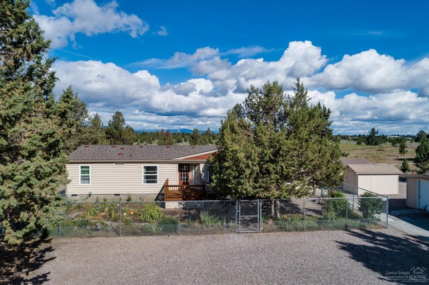 Turn key home with two shops and Mt. Jefferson views on 2 acres! Home features: an upgraded kitchen with solid surface counters, oak cabinets, & stainless steel appliances, a pellet stove in the family room, skylights & an abundance of windows for great natural lighting. The home has had extensive upgrades including newer: windows, roof, siding, furnace, heat pump, flooring, painting, & shop upgrades!The large master suite is on the main level with separation from the other bedrooms. Enjoy outdoor living & Cascade Mountain views off the expansive back deck, patio, & fenced back yard. The big shop is 48'x36' with 3 overhead doors, 1 sliding door, loft storage, 220V electrical & a 12'x36', insulated workshop area with concrete floors & built in workbenches. The 2nd shop is 36'x24', fully insulated & heated with two overhead doors and an additional attached 20'x10' hobby room. Additional outbuildings are a 12'x8' storage shed & a greenhouse. This one is truly a must see property!